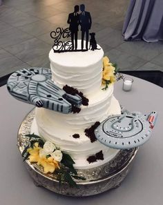 a star trek themed wedding cake on a table