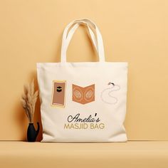 Welcome to my shop!  Personalized Masjid Tote Bag Introducing our Personalized Masjid Tote Bag, the perfect blend of elegance and practicality. Designed to accompany you to the masjid, study groups, or daily errands, this versatile tote bag allows you to carry your essentials while expressing your faith. Personalize your tote with your name, this tote bag is large enough to fit your prayer mat, Quran, notebooks, and other essentials.  - 100% cotton canvas - Available in natural color.  - Heavy fabric (12 oz/yd² (406.9 g/m - Sewn-in label Returns or Exchanges: - All of our Tote Bags are custom printed just for you. So we do not accept returns or exchanges. - If there are any issues with the Tote Bag, please message us and we will replace it as soon as possible.  Please note that the colors White Tote Bag For Personal Use, White Satchel With Dust Bag As Gift, White Softback Shoulder Bag Gift, White Softback Bag For Gift, White Softback Bags For Gifts, Gift Canvas Satchel Bag With Removable Pouch, Canvas Satchel Bag With Removable Pouch As Gift, Large Capacity Tote Bag For Personal Use, Muslim Teacher