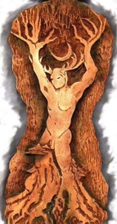 a wood carving of a man with trees on his back