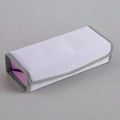 A hidden magnet makes it easy to open and close even with one hand. The lid opens wide for easy viewing and removal of contents. This large capacity pen case can hold approximately 25 pens with a 12mm shaft diameter or 30 pens with a 10mm shaft diameter.  A mesh pocket with a rubberized opening on the inside allows for separate storage of sticky notes, erasers, and other items. This can also be used as a smartphone stand by placing it inside the pen case. Available in 5 colors! "I like this pencil case because it acts like a pen tray when open and everything is in sight. If my pencil case has too many pockets I forget what's in there! This case is best suited for many gel pens and mildliners." ~ Finn Specifications: -Width 205mm x Height 48mm x Depth 93mm Note: This listing is just the pen Pen And Pencil, Japanese Stationery, Pens And Pencils, Pencil Pouch, Pen Case, Erasers, Cosmetic Case, Sticker Shop, Pouch Bag