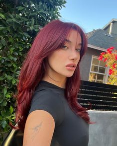 Pop star red is one of the biggest hair color trends for winter 2024, and it will make you feel ready to hit the stage. Ahead, everything you need to know about the shade and how to get it yourself. Red Hair Trends, Red Hair Looks, Wine Red Hair, Cherry Hair, Red Hair Makeup