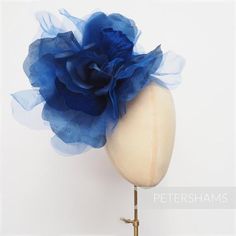 WOWZA! Meet 'Pricilla', by far our largest and most flamboyant millinery flower. Ideal for Royal Ascot, this over-the-top cobalt blue flower is made up of giant floaty organza and silk petals with velvet accent petals at it's centre. It's an absolute whopper of a flower! Try putting two on a fascinator base or headband for an instant statement hat! Flower measures:Width: Around 25cm (10 inches) when splayed outLength of wired stem: 9cm (3.5 inches)We take great care in making sure your flower do Blue Fascinator With Handmade Flowers For Kentucky Derby, Blue Mini Hats With Handmade Flowers For Royal Ascot, Blue Hats With Handmade Flowers For Kentucky Derby, Blue Hats With Handmade Flowers For Royal Ascot, Blue Handmade Flowers Fascinator For Races, Blue Handmade Flowers Fascinator For Party, Formal Blue Fascinator With Handmade Flowers, Elegant Blue Fascinator With Handmade Flowers, Fitted Blue Headpiece With Handmade Flowers