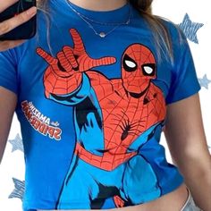 Spider-Man Crop Top Unleash your inner superhero with this vibrant Spider-Man crop top! Featuring a dynamic Spidey graphic and a comfy, stretchy fit, it's perfect for any fan. Whether you're swinging through the city or just hanging out, this top adds a playful touch to your look. 🚚 Shipping Information: * USA: Standard delivery in 5-9 business days  Express in 2-5 business days 🚀 * EU: Delivery in 2-5 business days 🇪🇺 * Other Countries: Standard shipping in 5-29 business days 🌍, Express in Fitted Anime Print Tops For Streetwear, Character Print Tops For Summer Sports, Halloween Graffiti Print Crew Neck Top, Casual Anime Print Top For Halloween, Blue Y2k Top With Graphic Print, Fitted Red Tops With Character Print, Fitted Red Top With Character Print, Cosplay Pop Culture Top With Cartoon Print, Cosplay Pop Culture Tops With Cartoon Print