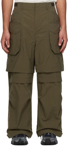 Crinkled nylon canvas trousers. · Layered construction · Adjustable hook fastenings at waistband · Belt loops · Zip-fly · Four-pocket styling · Detachable panel at legs for alternate styling · Adjustable press-stud tab and zip vent at cuffs · Cargo pocket at outseams Supplier color: Khaki Juun J, Green Cargo Pants, Green Cargo, Cargo Pocket, Cargo Pant, Press Studs, Color Khaki, Bottoms Pants, Cargo Pants