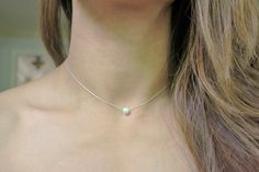 "Dainty, minimalist, layering, necklace or choker for everyday use. Design: FWP Chocker or Necklace Metal: Sterling Silver Stone: Button Freshwater Pearl Chain Style: Swage FWP Diameter: 6 mm Available Lengths: 14\", 15\", 16\", 17\", 18\", 19 Please take note that 14\", 15\" and 19\" are not standard lengths and will be customized as requested. Therefore, it is not returnable. Any stones and pearls are naturally imperfect. ------------------------------------------------------------------------ Layered Necklaces Silver, Everyday Necklace, Layering Necklace, Necklace Dainty, Pearl Choker, Choker Necklaces, Pearl Chain, Metal Necklaces, Dainty Necklace