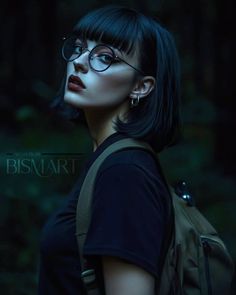 a woman wearing glasses and a backpack in the dark with her head tilted to the side