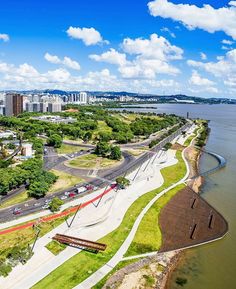 an aerial view of a city and the water