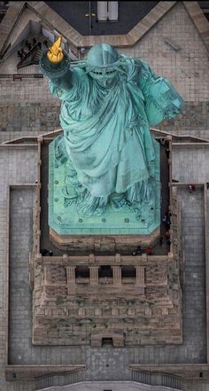 an aerial view of the statue of liberty in new york city