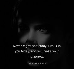 a woman's face with the words never regt yesterday life is in you today, and you make your tomorrow