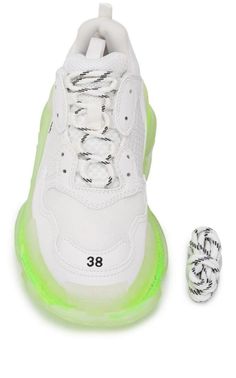 Balenciaga's white Triple S trainers are an avant-garde reworking of one of the label's cult styles. They're crafted from mesh and leather panels with an embroidered logo at the side, then set on a chunky fluorescent rubber sole.White/neon yellow Logo print to the sideRound toeFront lace-up fasteningPull-tab at the heel Chunky rubber soleComposition: Leather, mesh and leather panelsSole: Rubber 100%Lining: Fabric 100% Streetwear Custom Mesh Sneakers With Perforations, White Custom Sneakers With Translucent Outsole In Mesh, Custom White Mesh Sneakers With Translucent Outsole, White Mesh High-top Sneakers With Laces, Designer White High-top Sneakers For Streetwear, White Designer Mesh Sneakers, Designer White Mesh Sneakers, Designer Custom White Sneakers With Translucent Outsole, Balenciaga Triple S Sneakers