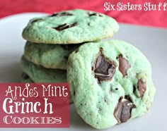 three mint green chocolate chip cookies on a white plate with the title six sisters stuff