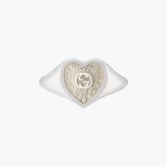 Sterling silver Gucci heart signet ring with white mother-of-pearl enamel. In the center of the Enamel the interlocking G logos is raised. The top of the ring is 0.04" in size. Mother Of Pearl Signet Ring, Heart Signet Ring, Mother Of Pearl Ring, Lighthouse Point, Logo Style, Sterling Silver Heart, Pearl Ring, Signet Ring, Silver Heart