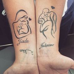 two people with matching tattoos on their arms