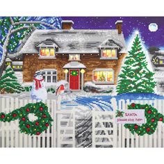 a cross stitch christmas scene with a house and wreaths