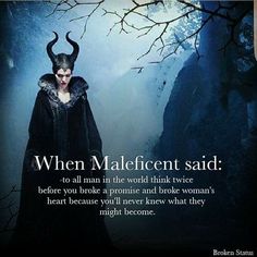 a maleficent is standing in the middle of a forest with horns on his head