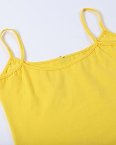 Details: Yellow cami top with meme and strawberry graphical printTop Length: CroppedSleeve Length: SleevelessMaterials:95% Polyester + 5% Spandex Stretch Casual Camisole Crop Top, Casual Stretch Camisole Crop Top, Trendy Spaghetti Strap Tops, Solid Color Y2k Tank Top For Summer, Y2k Style Solid Color Tank Top For Summer, Seamless Cotton Tank Top For Summer, Solid Cotton Camisole Top, Y2k Spaghetti Strap Tops For Spring, Yellow Sleeveless Y2k Top