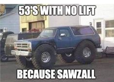 there is a monster truck parked in front of a house with the caption 53's with no lift because sawall