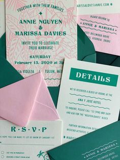 the wedding stationery is laid out on top of each other, including pink and green envelopes