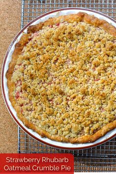 a strawberry rhubarb oatmeal crumble pie on a cooling rack