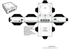 an origami cut out of a record player with its lid open and instructions to make it