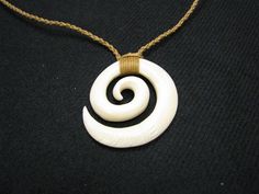 Adjustable White Spiral Jewelry, Maori Necklace, White Adjustable Spiral Jewelry, Handmade White Spiral Necklaces, Traditional Handmade Spiral Jewelry, Spiral Shell Necklace, Hawaiian Shell Necklaces, Kukuiula Necklace Bead Local At Lihue Hawaii, Maori Fish Hook Necklace