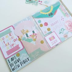 an open scrapbook with different types of cards