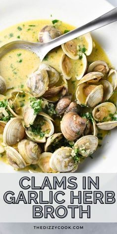 clams in herb butter broth on a white plate with text overlay that reads clams in herb butter broth