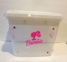 a plastic container with barbie logo on it