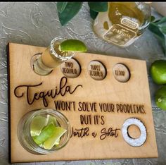 a wooden sign that says tequila won't solve your problems, but it's not a shot