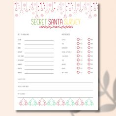 a printable secret santa survey with christmas trees and snowflakes on the side