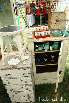 an old dresser is sitting in the grass