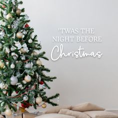 there is a christmas tree with ornaments on it and the words, twas the night before christmas