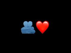 two red and blue hearts sitting next to each other on a black background with the words i love you