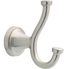 a metal hook on the side of a wall with a curved handle and two round knobs