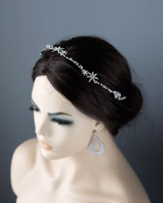 Crafted from shining starlight and exquisite antique silver, this headpiece exudes simplicity and elegance. Delicate vines adorned with shimmering crystal stars and intricate crystal beads create a stunning display of luxury. This headband measures about 15.5 inches long and 1 inch at the widest. Winter Wedding Headpiece, Star Headpiece, Diamond Headpiece, Silver Hair Accessory, Silver Headpiece, Spooky Forest, Crystal Headpiece Wedding, Stars Wedding, Silver Hair Accessories