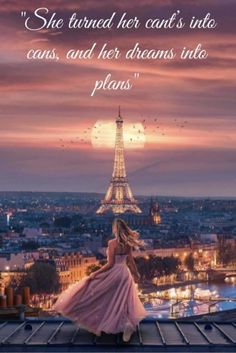 a woman standing on top of a roof with the eiffel tower in the background