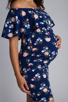 This flirty, floral off-the-shoulder maternity mini dress hugs you in all the right places to show off that growing baby bump. With a ruffled neckline, this Hot Mommy dress is perfect for baby showers, gender reveal parties, or a night out. Off-the-shoulder Nursing friendly For Hot Mommy during pregnancy and beyond Fabric: 95% polyester, 5% spandex Packaged and shipped by our all-female owned and operated business. For sizing questions, click here for our Hot Mommy and Me Sizing Guide. Off Shoulder Maternity Dress, Floral Short Dress, Mommy Dress, Hot Mommy, Floral Dresses Short, Floral Print Fabric, Nursing Friendly, Floral Ruffle, Reveal Parties