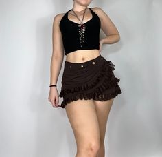 The cutest ruffled mini skirt. Features a fully adjustable snap button waist to fit almost any size. Model is 5'2 and wearing a S/M. Grunge Mini Skirt, Ruffled Mini Skirt, Fairy Skirt, Hippie Pants, Womens Skirts, Stylish Pants, Pair Of Pants, Snap Button, The Cutest