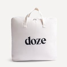 a white duffle bag with the word doze printed on it's side