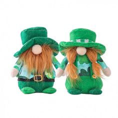 two stuffed toy leprezions wearing green hats