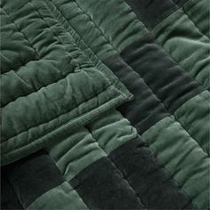 the quilted material is green and black