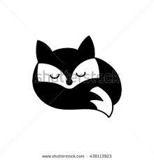 a black and white fox sleeping with its eyes closed