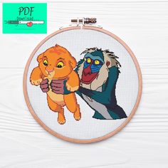 the lion and the witch cross stitch pattern is shown in front of a white background