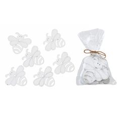 white bees cutouts in plastic bag with string