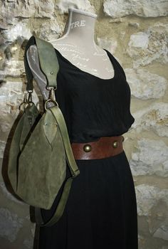 Features : - Olive green suede, - Green hand dyed leather, - Zipped bag, - Unlined, - Inside cotton zipped pocket, Size: - Height 10.63 inch, - Lenght 14.96 inch, - Shoulder belt is adjustable. Handmade olive green soft suede  hobo bag.  The bag is closed with a metallic zip.  Inside is unlined and there is a large cotton zipped pocket. There is an adjustable shoulder strap made with strong hand dyed leather and is possible add a leather amovable short handle. This medium size hobo bag is a perfect bag for every moment you can add a soft suede tassel https://www.etsy.com/it/listing/1524528378/nappina-portachiavi-in-pelle-scamosciata?click_key=f9e2bd17e98b408d7a5d75a77e936f340dffcf14%3A1524528378&click_sum=5617ff27&ref=shop_home_active_2&frs=1 Contact me for any information Suede Hobo Bag, Favorite Purse, Strong Hand, Shoulder Belt, Green Soft, Green Hand, Suede Tassel, Hobo Bags, Longchamp Le Pliage Backpack