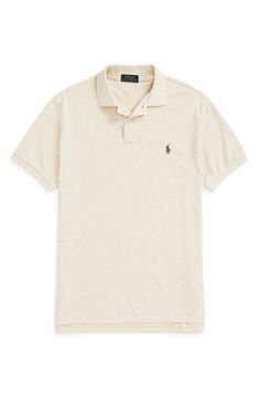 Cut from cool, breathable cotton piqué in a comfortably relaxed fit, this polo has been setting the brand's style standard since 1972. 28 1/2" front length; 29 1/2" back length (size Medium) Button half placket Rib collar Short sleeves with rib cuffs 100% cotton Machine wash, dry flat Imported Summer Cotton Polo Collar Sweater, Cotton Polo Sweater For Summer, Classic Fitted Polo Shirt With Spread Collar, White Casual Polo Shirt With Seamless Collar, Casual White Polo Shirt With Seamless Collar, Relaxed Fit Polo Shirt, Classic Short Sleeve Golf Polo Shirt, Classic Polo Sweater With Johnny Collar For Summer, Solid Cotton Polo Sweater With Polo Collar