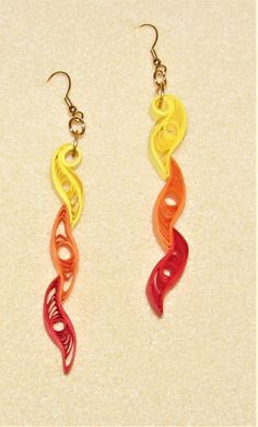 Handmade quilled paper earrings, quilling, quilled jewelry, paper earrings, quilled earrings, paper jewelry, fall earrings, autumn earrings Quilled paper earrings (090123) I love making quilled jewelry.; the possibilities are endless. The uniqueness of it appeals to the artistic side of our being. Many people are surprised when you tell them it is made from paper. I use a paper sealant on all my earrings.on all my earrings.  It not only makes them firm but also protects them from moisture. (They are not waterproof, however.) The paper part of these earrings measure approx. 2 3/4" in length.  The ear wires are gold plated. Wear these brightly colored earrings to your next party or gathering and you will be surprised at the reactions you receive when you tell people they are made from paper! Paper Quilling Earrings Unique, Paper Quilled Earrings, Quilling Jewelry Ideas, Diy Quilling Earrings, Earrings Quilling, Paper Quilling Earrings, Earrings Paper, Quilled Earrings, Autumn Earrings