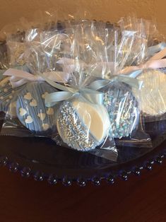 a basket filled with blue and white cookies