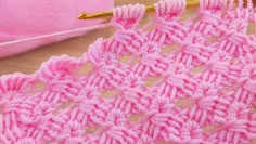 the crochet stitch is being worked on