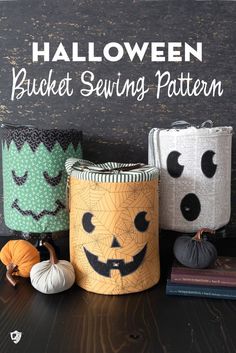 halloween bucket sewing pattern with pumpkins and jack - o'- lantern faces on it